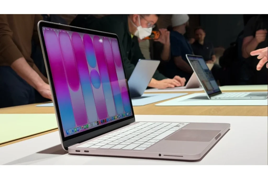 A side profile of the Apple MacBook Neo with a colorful desktop wallpaper, exemplifying the style and performance expected of the Best Student Laptops.
