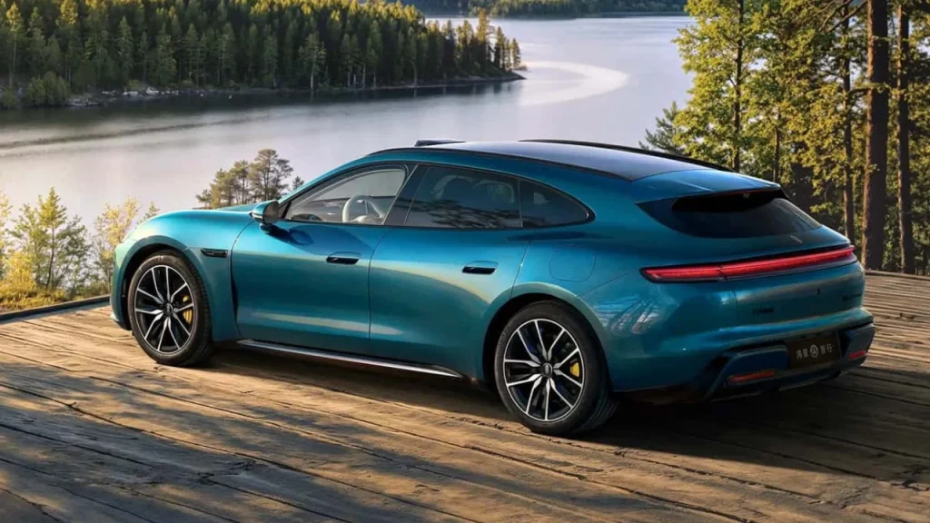 A teal electric vehicle parked on a wooden deck near a scenic lake, representing models from one of the Best EV brands.